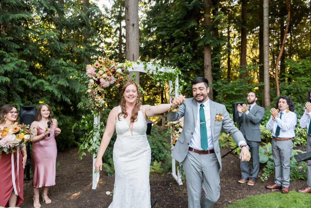Bainbridge-Island-Wedding-Aisle-Couple-Walking Couple just married walking down aisle