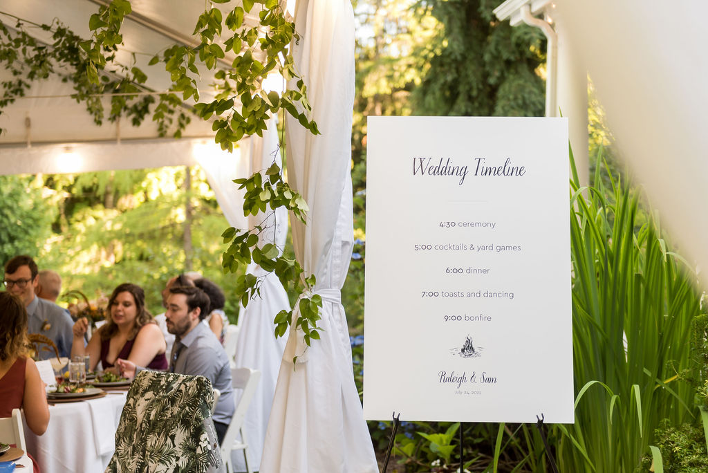 Bainbridge-Island-Wedding-Tent-And-Sign Tent greenery and sign