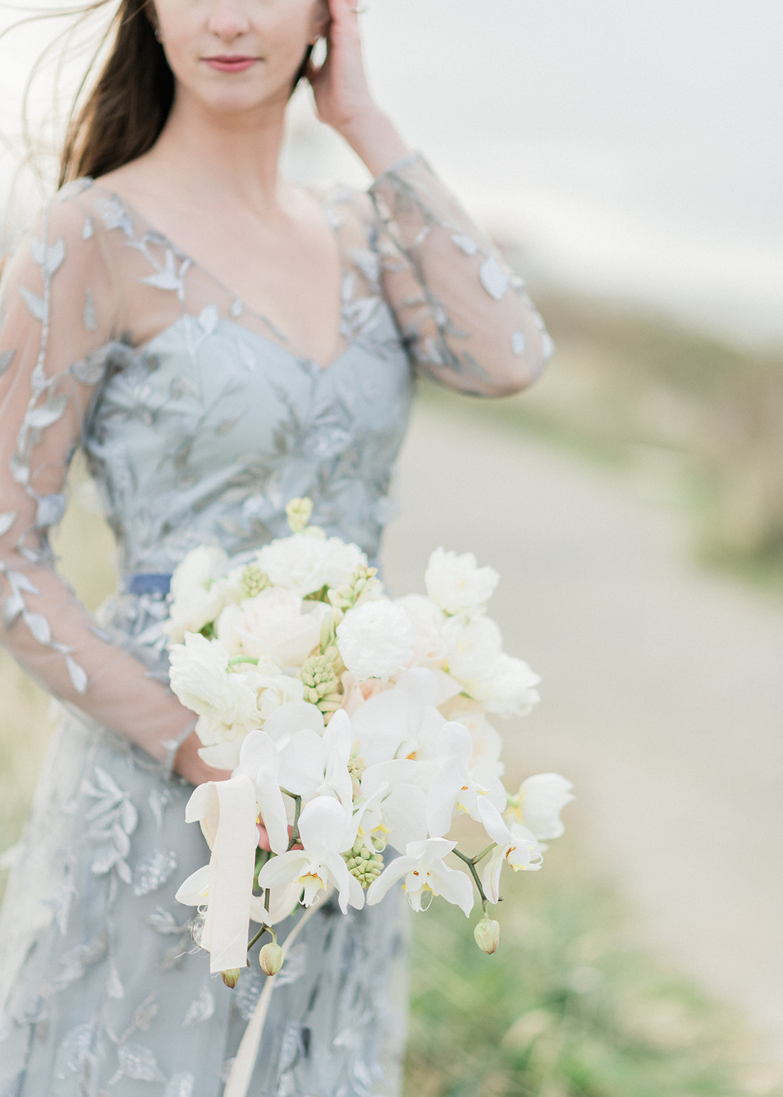 Discovery-Park-Elopement-Bride-with-Bouquet.jpg Bride standing with bouquet