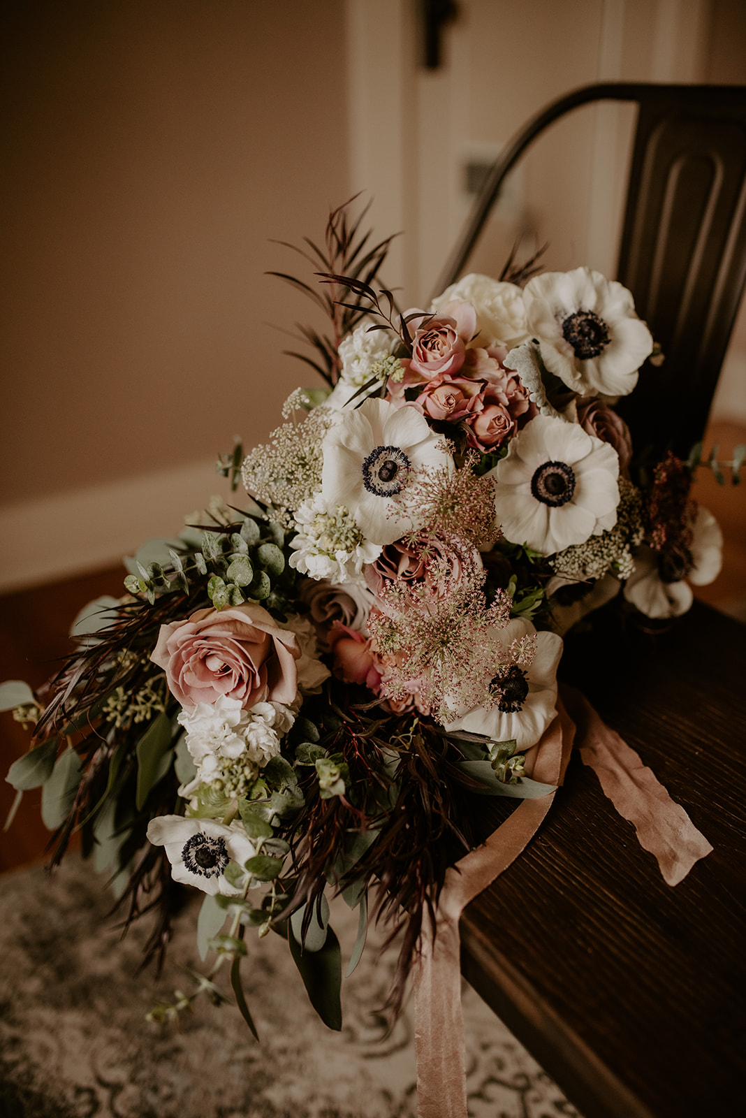Kelley-Farm-Wedding-Bridal-Bouquet-On-Chair.jpg Bouquet resting on chair