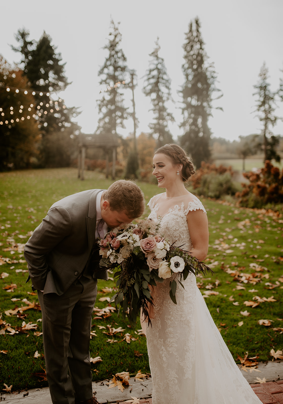 Kelley-Farm-Wedding-Smell-the-Flowers.jpg The groom stopping to smell the bride's flowers