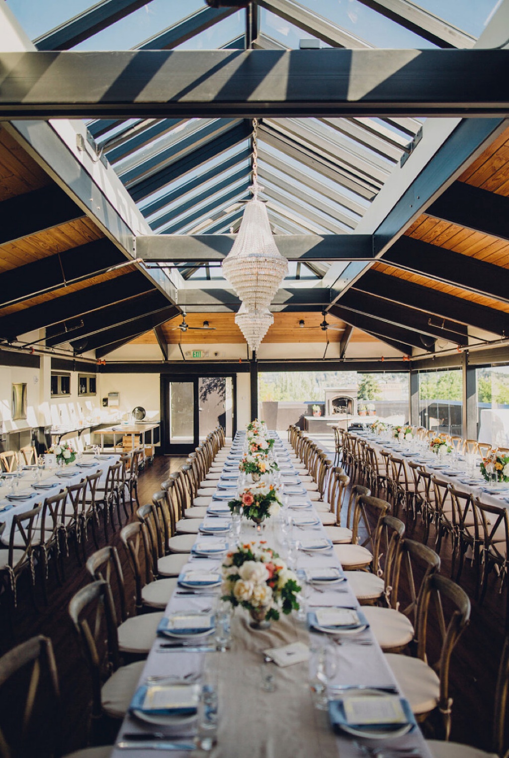 Folk Art Flowers Best Outdoor Wedding Venues in Seattle_0003 Long tables set under the skylight of the Olympic Rooftop Pavillion