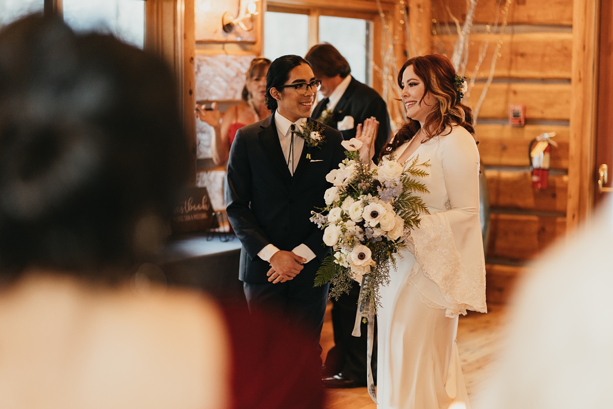 The couple entering the reception