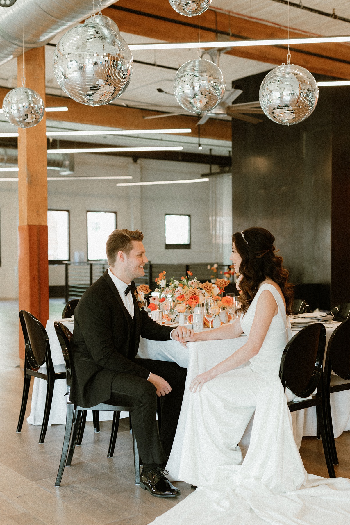 Block-41-Wedding-Couple-Head-Table The couple sitting at their head table at Block 41