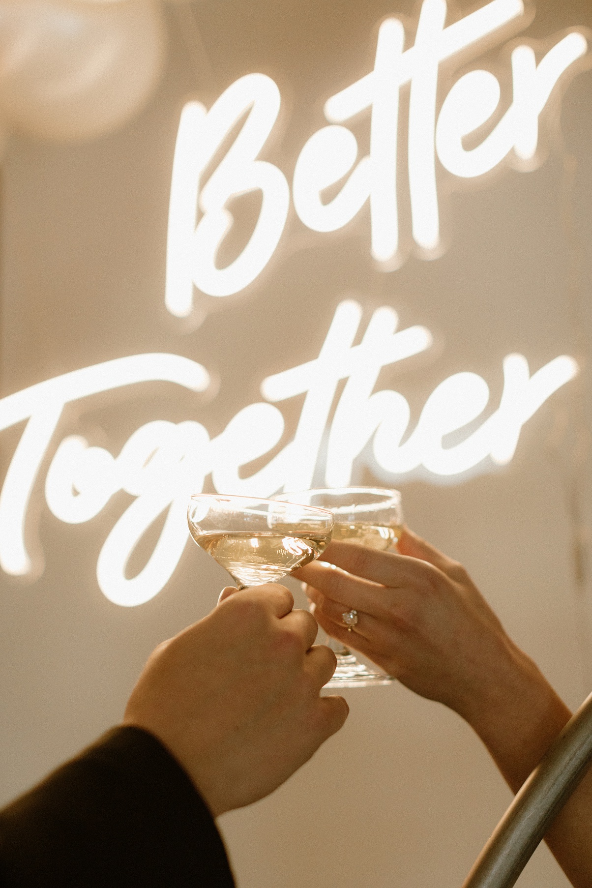 Block-41-Wedding-Neon-Sign Block 41 wedding neon sign that says "better together" with a champagne toast