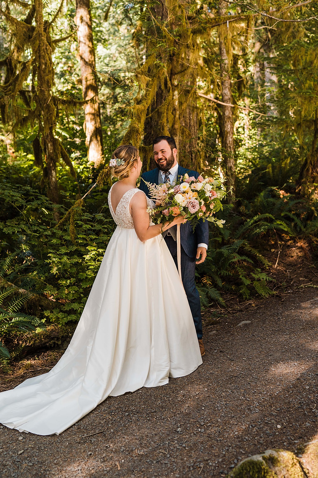 Mountain-Wedding-with-Vibrant-Summer-Blooms-First-Look The sweet first look in the forest