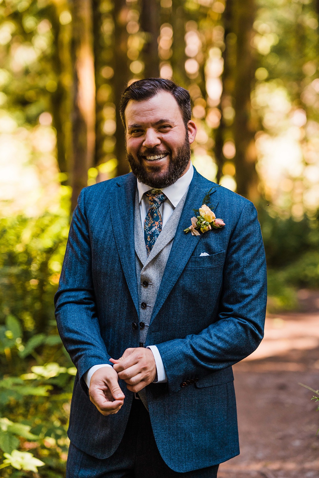 Mountain-Wedding-with-Vibrant-Summer-Blooms-Groom-Getting-Ready The groom gets ready for the couple's first look