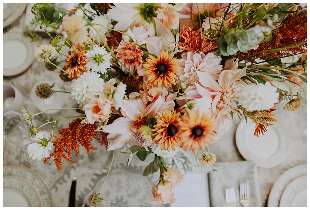 Seattle-Wedding-Florist-Bloom-Poet-Fall-Wedding-Boho-Flowers-Centerpiece an aerial view of a boho floral centerpiece for this fall wedding