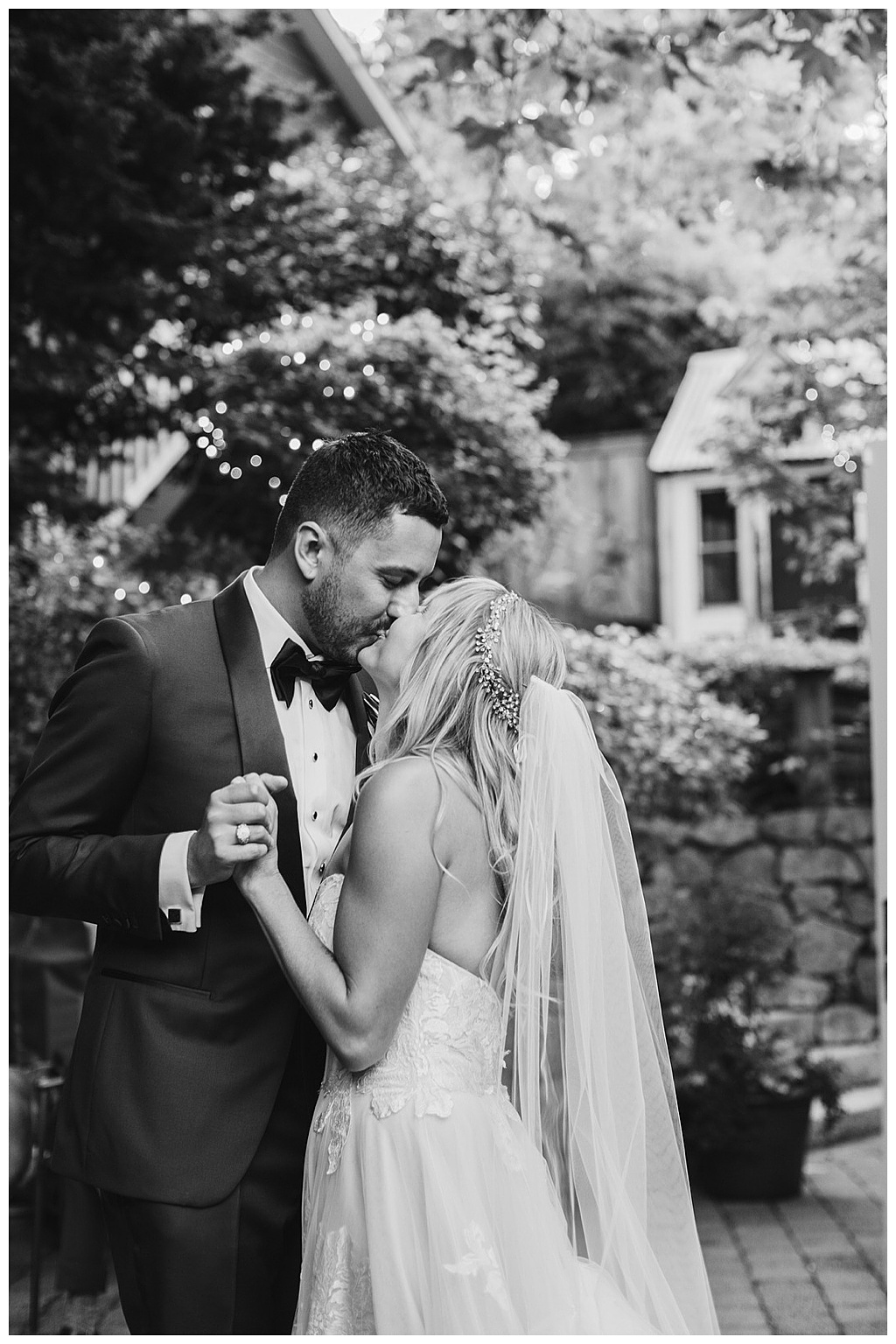 Seattle-Wedding-Florist-Bloom-Poet-Fall-Wedding-Boho-Flowers-Dancing-B&W the bride and groom share a romantic dance and kiss
