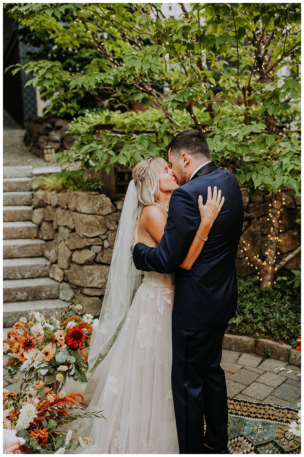Seattle-Wedding-Florist-Bloom-Poet-Fall-Wedding-Boho-Flowers-First-Kiss The couple has their first kiss during the ceremony