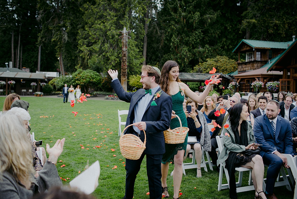 Bloom-Poet-Seattle-Wedding-Florist-Kiana-Lodge-Wedding-Adult-Flower-Girls Adult "flower girls" throw petals in the wedding aisle at Kiana Lodge