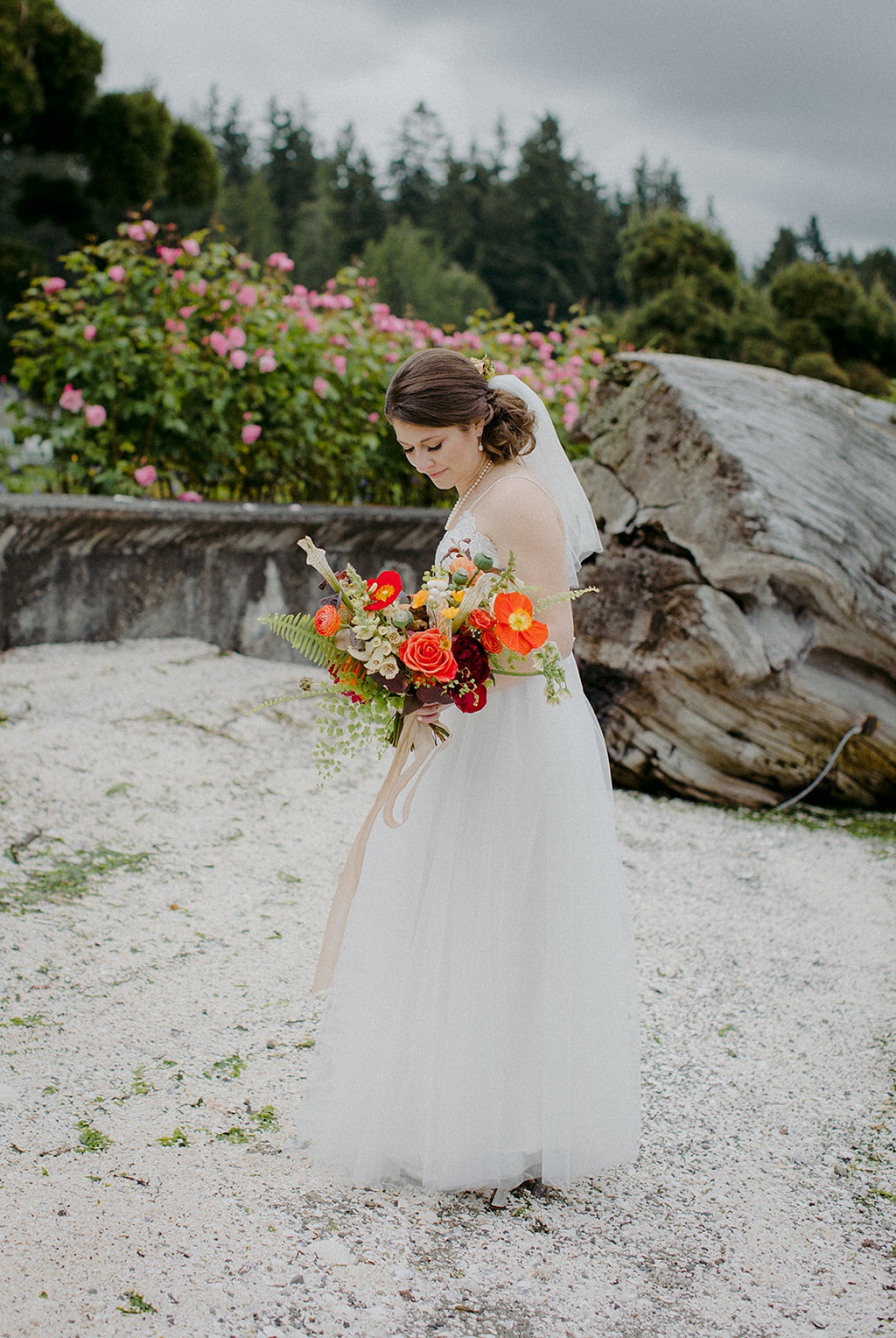 Bloom-Poet-Seattle-Wedding-Florist-Kiana-Lodge-Wedding-Bridal-Portrait The bride holding her bouquet at Kiana Lodge