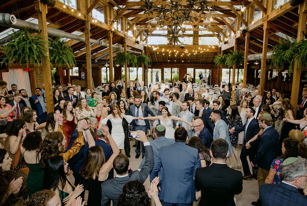 Bloom-Poet-Seattle-Wedding-Florist-Kiana-Lodge-Wedding-Jewish-Hora The family dancing in a circle