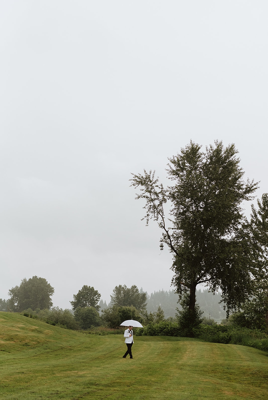 One of the grooms entering the ceremony