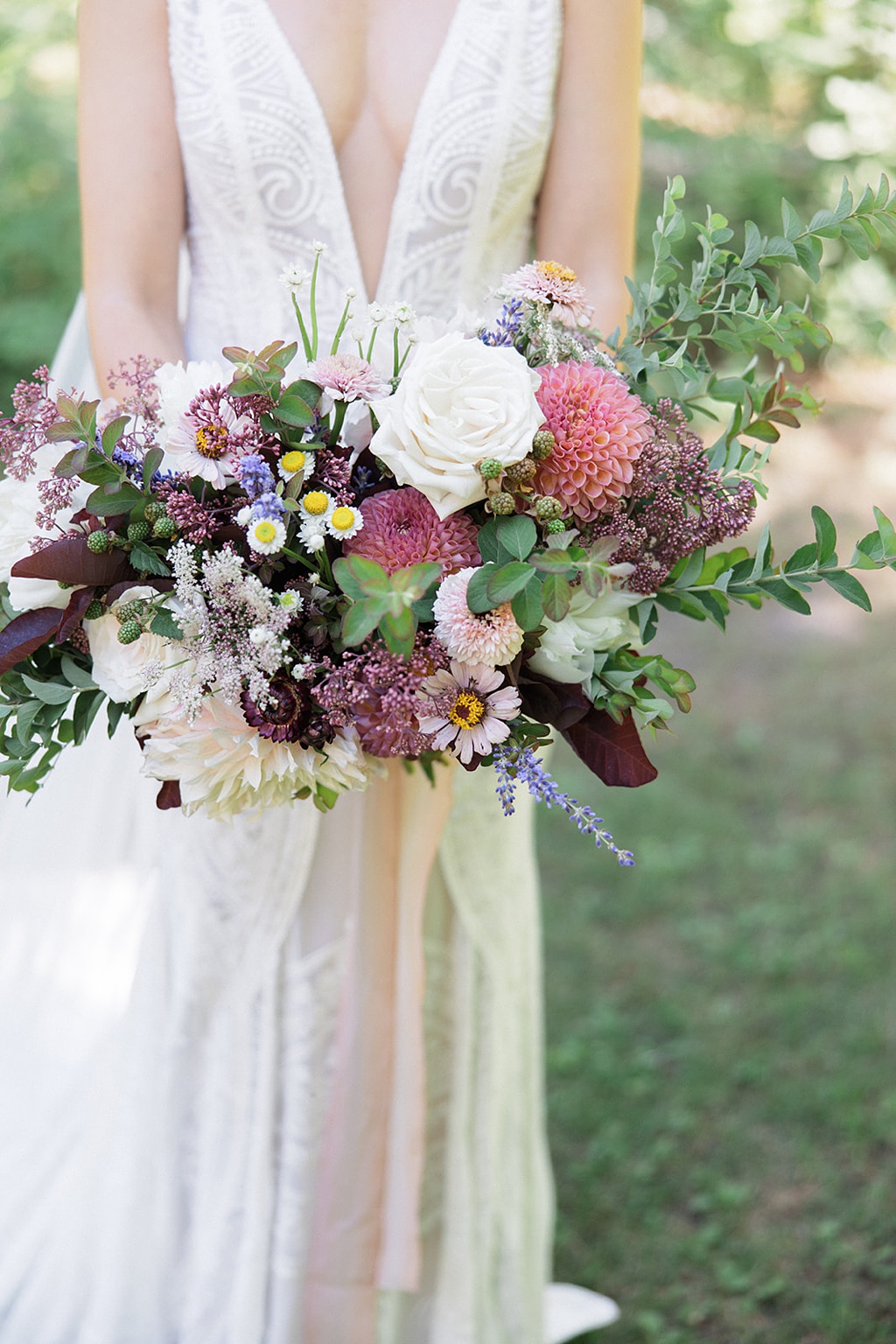 Bloom-Poet-Seattle-Wedding-Florist-Tierra-Retreat-Center-Purple-Bridal-Bouquet The bridal bouquet at this Tierra Retreat Center wedding uses seasonally inspired flowers in blush, pink, and purple tones