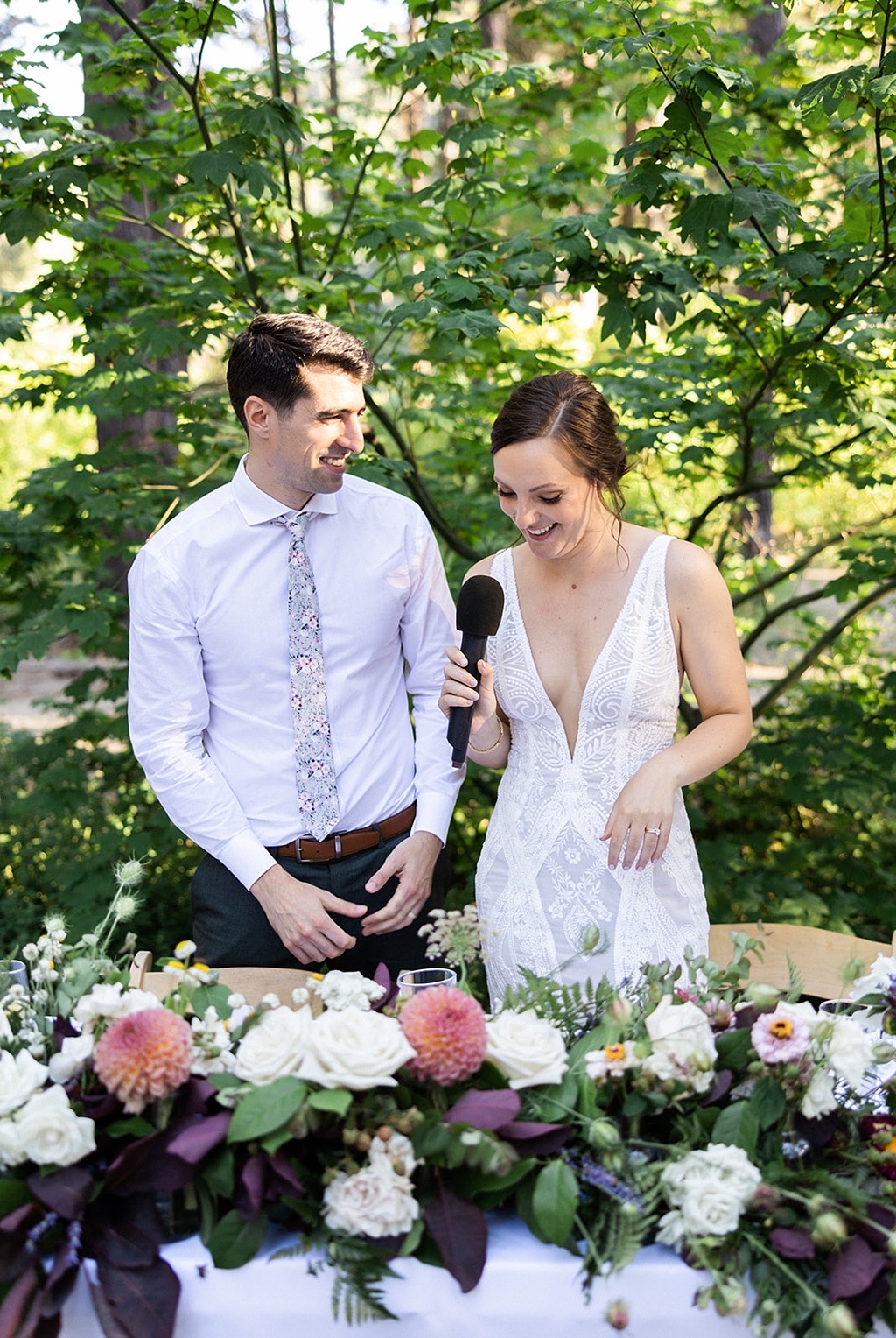 Bloom-Poet-Seattle-Wedding-Florist-Tierra-Retreat-Center-Wedding-Reception-Sweetheart-Table The bride and groom enjoy their sweetheart table flowers at this Tierra Retreat Center wedding reception
