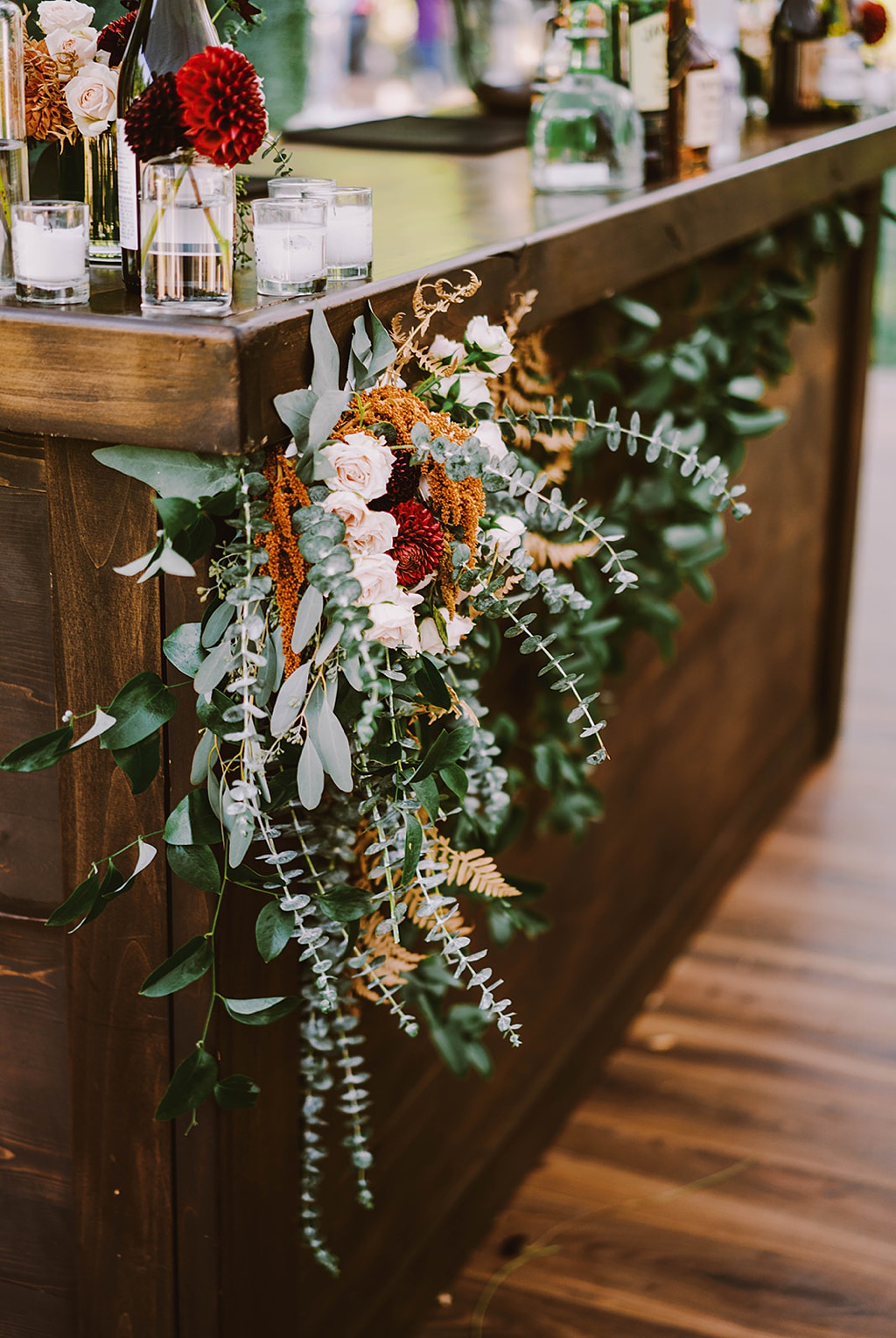Bloom-Poet-Seattle-Wedding-Florist-Summer-Wedding-Bar-Florals.jpg A bar floral installation full of textured greenery and blooms at this late summer wedding